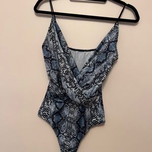 Blue and black snake print body suit